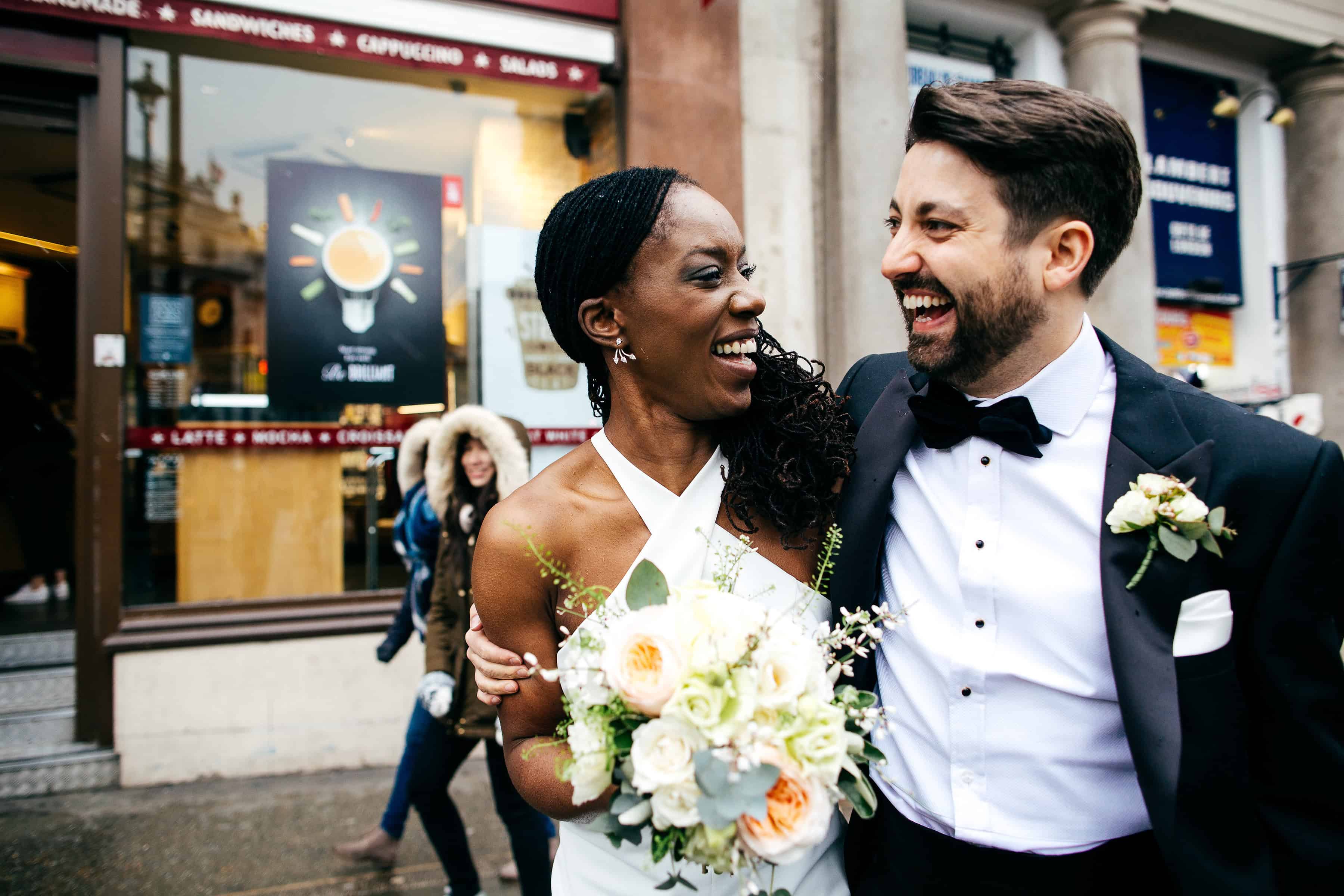 Super cool Stress free relaxed London Wedding beautiful black bride groom in tux