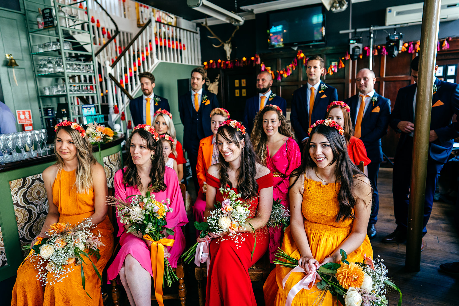 Gorgeous bridal party in tequila sunruse colours for cool London wedding photography