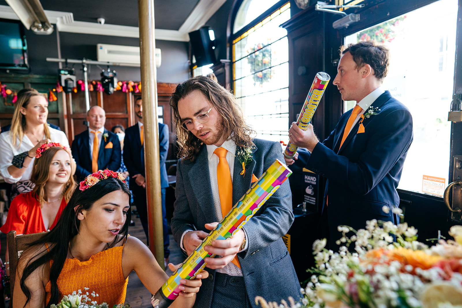 Groomsman and confetti cannons 