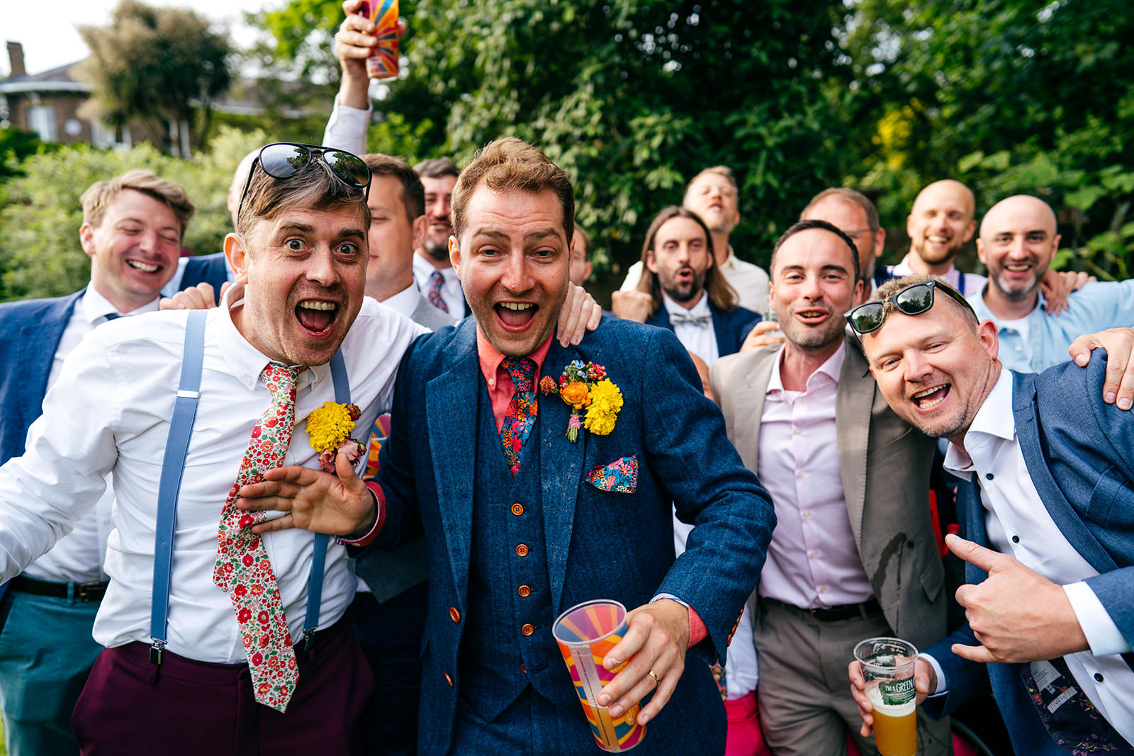 Close up of groom and his friends being silly during group shots 