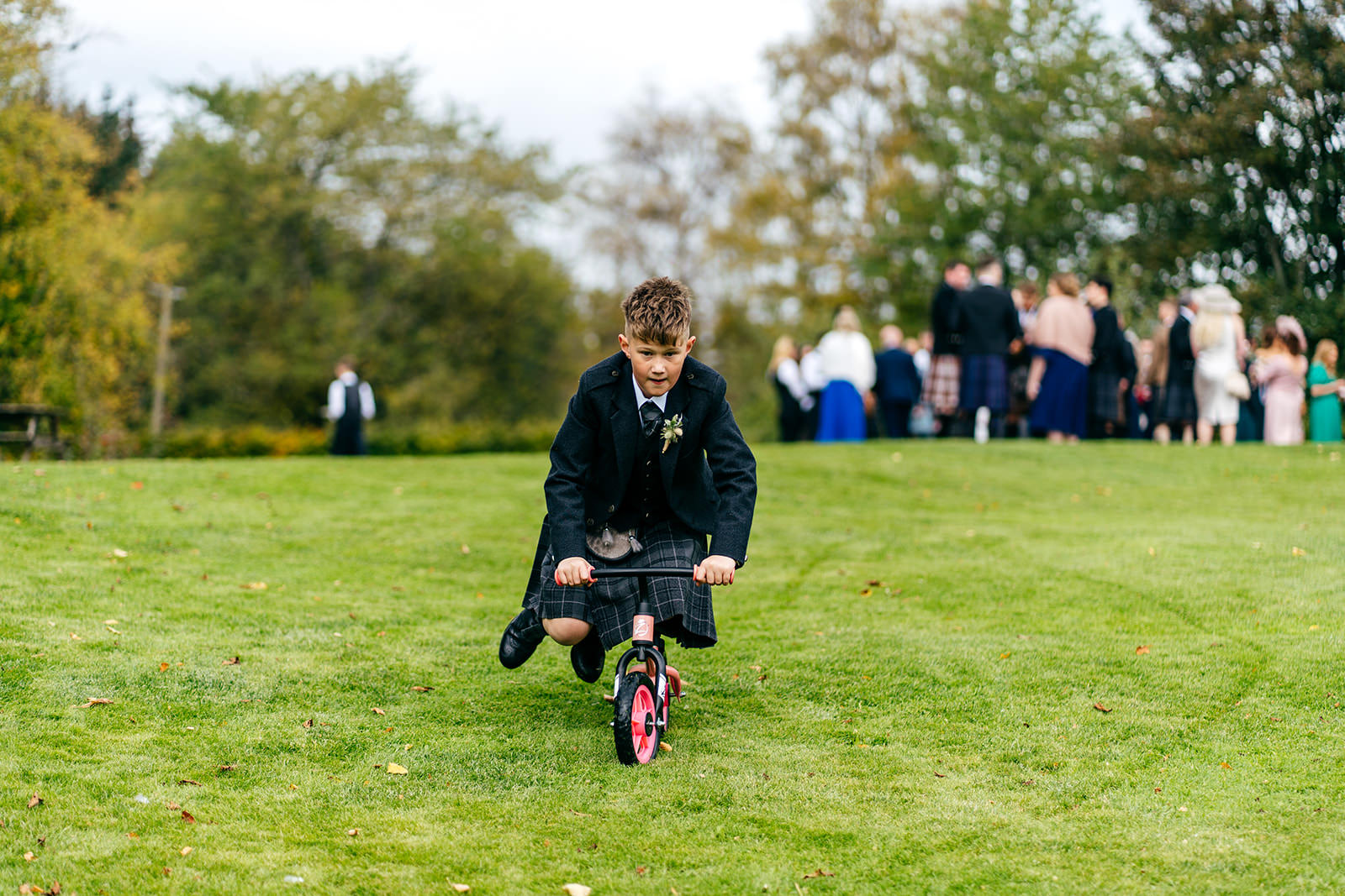 Page boy rides his sister'd tiny bike down Aberdeen hills 