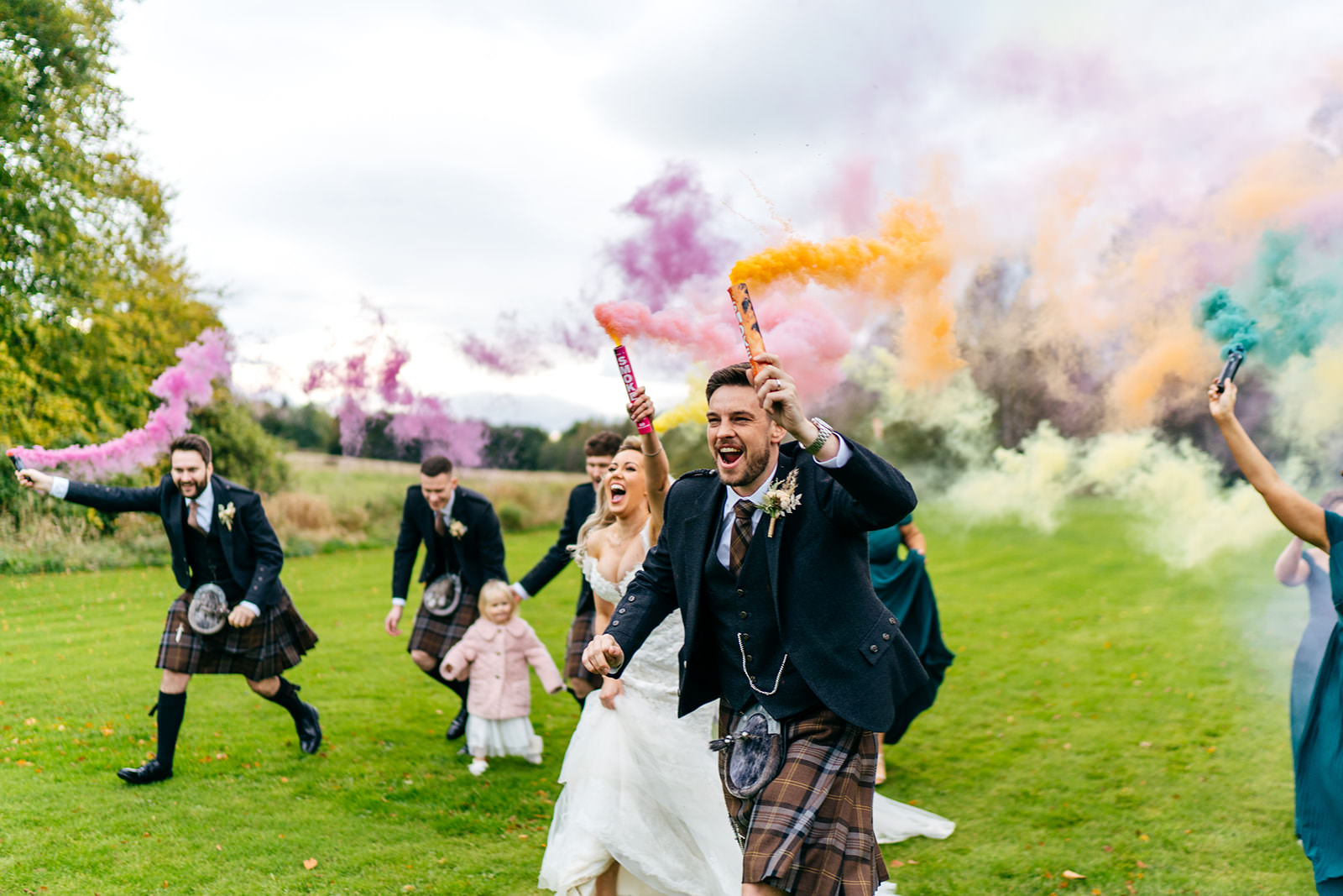 Smoke bombs group shots with whole bridal party